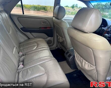 Бежевый Лексус РХ, объемом двигателя 3 л и пробегом 174 тыс. км за 4900 $, фото 10 на Automoto.ua