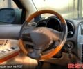 Бежевый Лексус РХ, объемом двигателя 3.3 л и пробегом 352 тыс. км за 6900 $, фото 2 на Automoto.ua