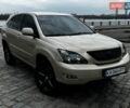 Бежевый Лексус РХ, объемом двигателя 3.3 л и пробегом 270 тыс. км за 9200 $, фото 1 на Automoto.ua