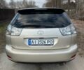 Бежевый Лексус РХ, объемом двигателя 3.3 л и пробегом 286 тыс. км за 9500 $, фото 3 на Automoto.ua