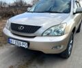 Бежевый Лексус РХ, объемом двигателя 3.3 л и пробегом 296 тыс. км за 9800 $, фото 1 на Automoto.ua