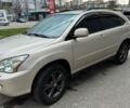 Бежевий Лексус РХ, об'ємом двигуна 3.3 л та пробігом 344 тис. км за 12800 $, фото 1 на Automoto.ua
