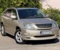 Бежевый Лексус РХ, объемом двигателя 3.5 л и пробегом 170 тыс. км за 9318 $, фото 2 на Automoto.ua