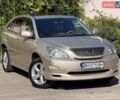 Бежевый Лексус РХ, объемом двигателя 3.5 л и пробегом 170 тыс. км за 9250 $, фото 2 на Automoto.ua