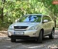 Бежевий Лексус РХ, об'ємом двигуна 3.46 л та пробігом 247 тис. км за 9988 $, фото 1 на Automoto.ua