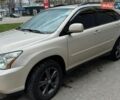 Бежевый Лексус РХ, объемом двигателя 3.3 л и пробегом 344 тыс. км за 12800 $, фото 1 на Automoto.ua