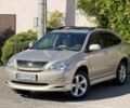 Бежевый Лексус РХ, объемом двигателя 3.5 л и пробегом 170 тыс. км за 9318 $, фото 1 на Automoto.ua