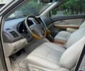 Бежевий Лексус РХ, об'ємом двигуна 3.46 л та пробігом 294 тис. км за 11399 $, фото 4 на Automoto.ua