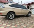 Бежевий Лексус РХ, об'ємом двигуна 3.3 л та пробігом 300 тис. км за 10468 $, фото 1 на Automoto.ua