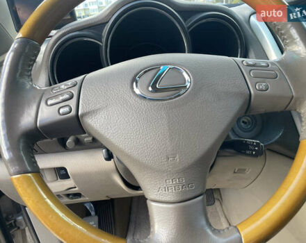 Бежевий Лексус РХ, об'ємом двигуна 3.46 л та пробігом 198 тис. км за 13500 $, фото 44 на Automoto.ua
