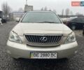 Бежевый Лексус РХ, объемом двигателя 3.5 л и пробегом 258 тыс. км за 9700 $, фото 1 на Automoto.ua