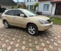 Бежевий Лексус РХ, об'ємом двигуна 3.3 л та пробігом 300 тис. км за 10468 $, фото 1 на Automoto.ua