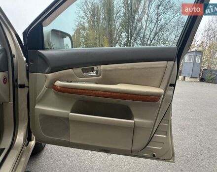 Бежевый Лексус РХ, объемом двигателя 3.46 л и пробегом 228 тыс. км за 10900 $, фото 87 на Automoto.ua