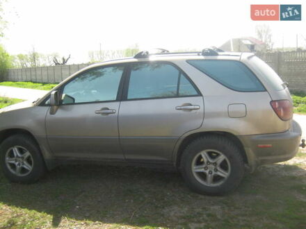 Бежевый Лексус РХ, объемом двигателя 3 л и пробегом 300 тыс. км за 5000 $, фото 1 на Automoto.ua