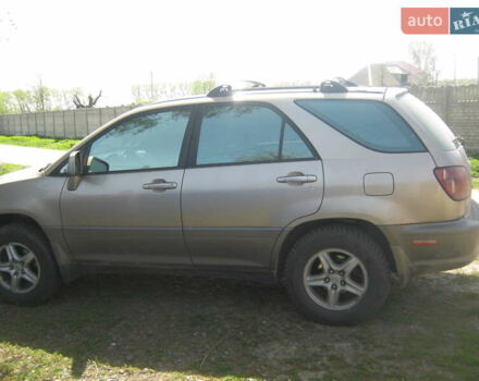 Бежевый Лексус РХ, объемом двигателя 3 л и пробегом 300 тыс. км за 5000 $, фото 1 на Automoto.ua