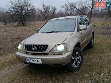 Бежевый Лексус РХ, объемом двигателя 3 л и пробегом 270 тыс. км за 5999 $, фото 1 на Automoto.ua