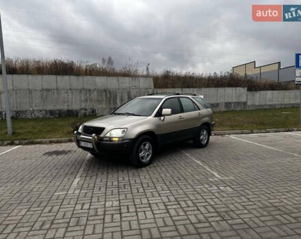 Бежевый Лексус РХ, объемом двигателя 3 л и пробегом 240 тыс. км за 5600 $, фото 1 на Automoto.ua