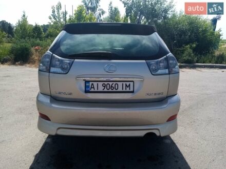 Бежевий Лексус РХ, об'ємом двигуна 3.46 л та пробігом 256 тис. км за 11200 $, фото 1 на Automoto.ua