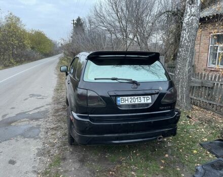 Чорний Лексус РХ, об'ємом двигуна 3 л та пробігом 300 тис. км за 5500 $, фото 4 на Automoto.ua