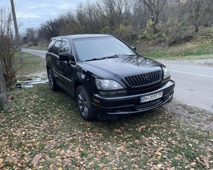 Чорний Лексус РХ, об'ємом двигуна 3 л та пробігом 300 тис. км за 5500 $, фото 2 на Automoto.ua