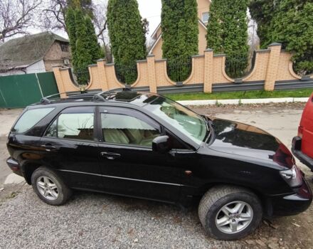 Черный Лексус РХ, объемом двигателя 3 л и пробегом 73 тыс. км за 7500 $, фото 2 на Automoto.ua