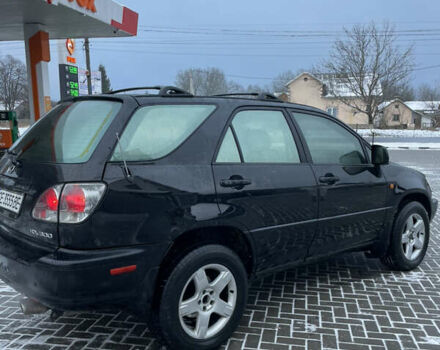 Чорний Лексус РХ, об'ємом двигуна 3 л та пробігом 285 тис. км за 5800 $, фото 4 на Automoto.ua