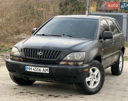 Черный Лексус РХ, объемом двигателя 3 л и пробегом 300 тыс. км за 4999 $, фото 1 на Automoto.ua