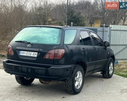 Черный Лексус РХ, объемом двигателя 3 л и пробегом 300 тыс. км за 4999 $, фото 16 на Automoto.ua