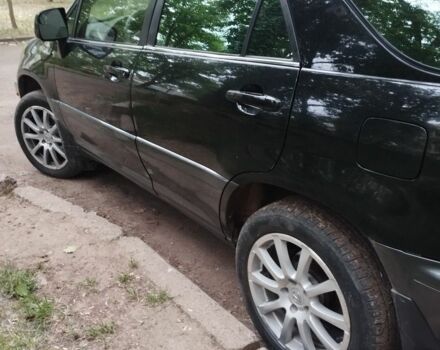 Черный Лексус РХ, объемом двигателя 3 л и пробегом 246 тыс. км за 5700 $, фото 2 на Automoto.ua