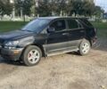 Чорний Лексус РХ, об'ємом двигуна 3 л та пробігом 300 тис. км за 4007 $, фото 1 на Automoto.ua