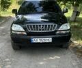 Черный Лексус РХ, объемом двигателя 3 л и пробегом 400 тыс. км за 7500 $, фото 1 на Automoto.ua