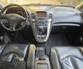 Черный Лексус РХ, объемом двигателя 3 л и пробегом 270 тыс. км за 6006 $, фото 2 на Automoto.ua