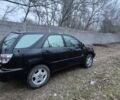 Черный Лексус РХ, объемом двигателя 3 л и пробегом 262 тыс. км за 7500 $, фото 1 на Automoto.ua
