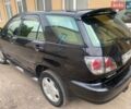 Черный Лексус РХ, объемом двигателя 3 л и пробегом 215 тыс. км за 7900 $, фото 3 на Automoto.ua