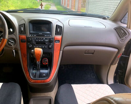 Черный Лексус РХ, объемом двигателя 3 л и пробегом 320 тыс. км за 5600 $, фото 1 на Automoto.ua