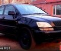 Черный Лексус РХ, объемом двигателя 30 л и пробегом 265 тыс. км за 6000 $, фото 1 на Automoto.ua