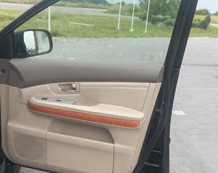 Черный Лексус РХ, объемом двигателя 3 л и пробегом 217 тыс. км за 6300 $, фото 3 на Automoto.ua