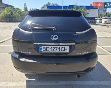 Черный Лексус РХ, объемом двигателя 3 л и пробегом 210 тыс. км за 7700 $, фото 1 на Automoto.ua
