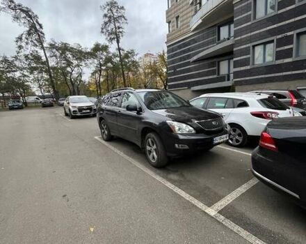 Черный Лексус РХ, объемом двигателя 3.3 л и пробегом 248 тыс. км за 7700 $, фото 1 на Automoto.ua