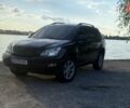 Черный Лексус РХ, объемом двигателя 3 л и пробегом 255 тыс. км за 8500 $, фото 1 на Automoto.ua