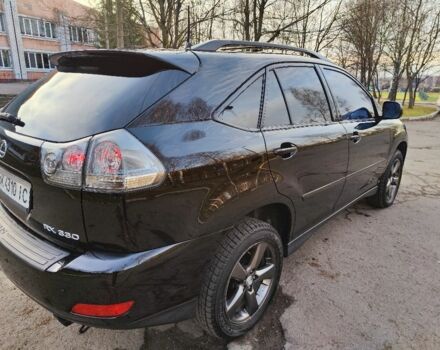 Черный Лексус РХ, объемом двигателя 3.3 л и пробегом 260 тыс. км за 8450 $, фото 1 на Automoto.ua