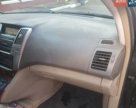 Черный Лексус РХ, объемом двигателя 3.3 л и пробегом 410 тыс. км за 7999 $, фото 1 на Automoto.ua