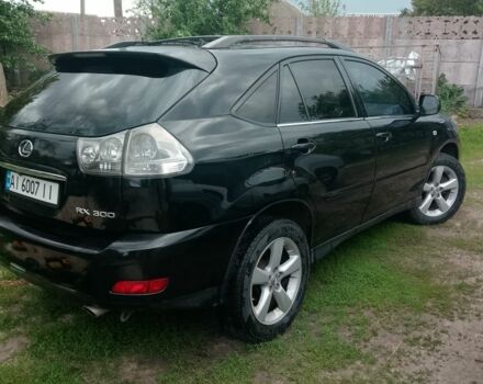 Чорний Лексус РХ, об'ємом двигуна 3 л та пробігом 246 тис. км за 7773 $, фото 2 на Automoto.ua