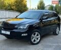 Черный Лексус РХ, объемом двигателя 3 л и пробегом 250 тыс. км за 8700 $, фото 1 на Automoto.ua