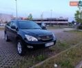 Черный Лексус РХ, объемом двигателя 3.31 л и пробегом 200 тыс. км за 8500 $, фото 1 на Automoto.ua