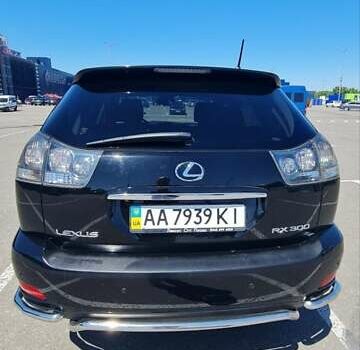 Черный Лексус РХ, объемом двигателя 3 л и пробегом 178 тыс. км за 11699 $, фото 3 на Automoto.ua