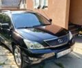Черный Лексус РХ, объемом двигателя 3 л и пробегом 295 тыс. км за 9500 $, фото 1 на Automoto.ua