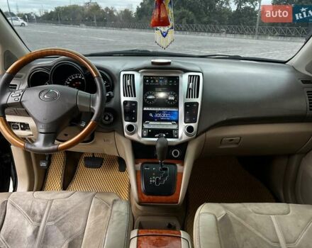 Черный Лексус РХ, объемом двигателя 3.3 л и пробегом 279 тыс. км за 9700 $, фото 4 на Automoto.ua