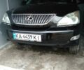 Черный Лексус РХ, объемом двигателя 3 л и пробегом 287 тыс. км за 11000 $, фото 1 на Automoto.ua