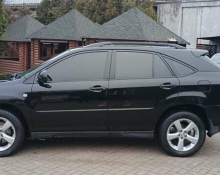 Черный Лексус РХ, объемом двигателя 3.31 л и пробегом 296 тыс. км за 8900 $, фото 1 на Automoto.ua